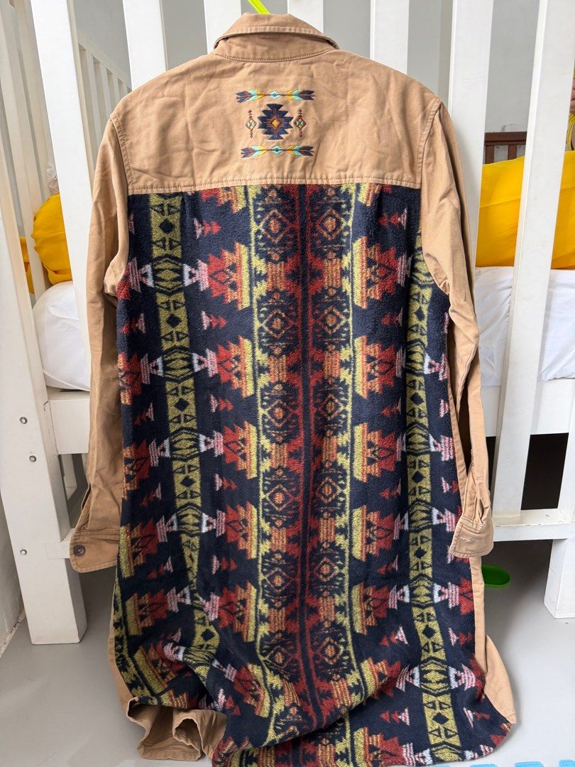 Titicaca Embroidered Long Jacket - Size L (Category: Coats, Jackets and Outerwear) located in Pasay City. Submitted by bbdavid (Listing ID 1413912265, Image 2). Description: - Unique Titicaca (Japan brand) jacket - Embroidered details - Tan base color - Patterned fabric accents on back, pockets, and sleeves - Button closures Length 38in Shoulder width 16in - Size L.