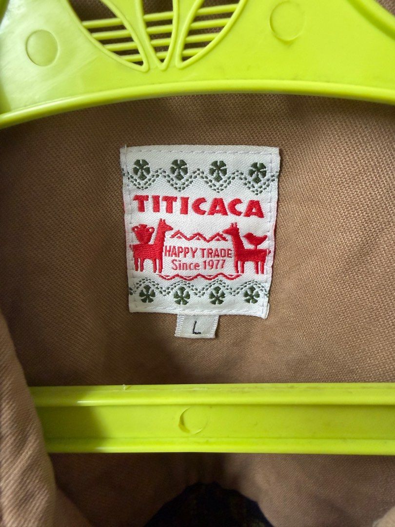 Titicaca Embroidered Long Jacket - Size L (Category: Coats, Jackets and Outerwear) located in Pasay City. Submitted by bbdavid (Listing ID 1413912265, Image 3). Description: - Unique Titicaca (Japan brand) jacket - Embroidered details - Tan base color - Patterned fabric accents on back, pockets, and sleeves - Button closures Length 38in Shoulder width 16in - Size L.