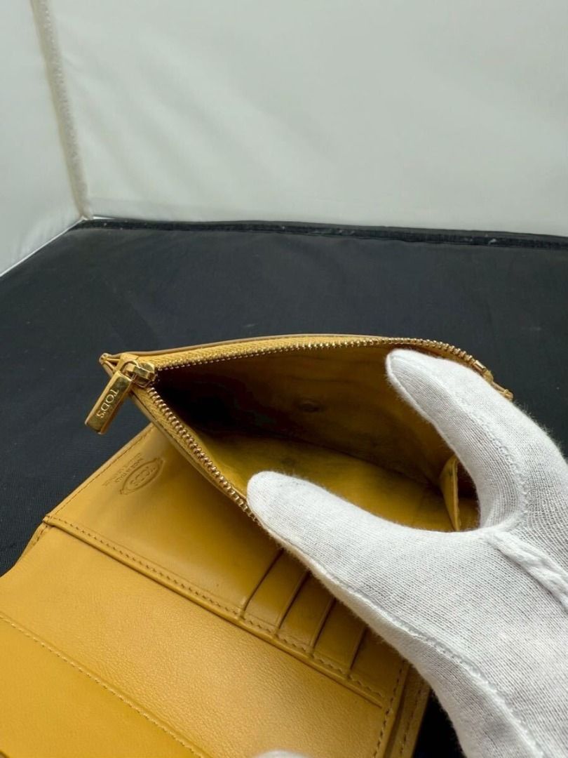 TOD'S Timeless Leather Wallet Long Wallet (Category: Wallets & Card holders) located in Paranaque City. Submitted by iveskixs (Listing ID 1413886804, Image 2). Description: Purchased in Japan Authenticity Guaranteed! - Colors may appear differently depending on your monitor settings - We do not handle imitations or counterfeits. - Please refrain from buying if you are looking for a new item or are sensitive about details. - For products marked "U