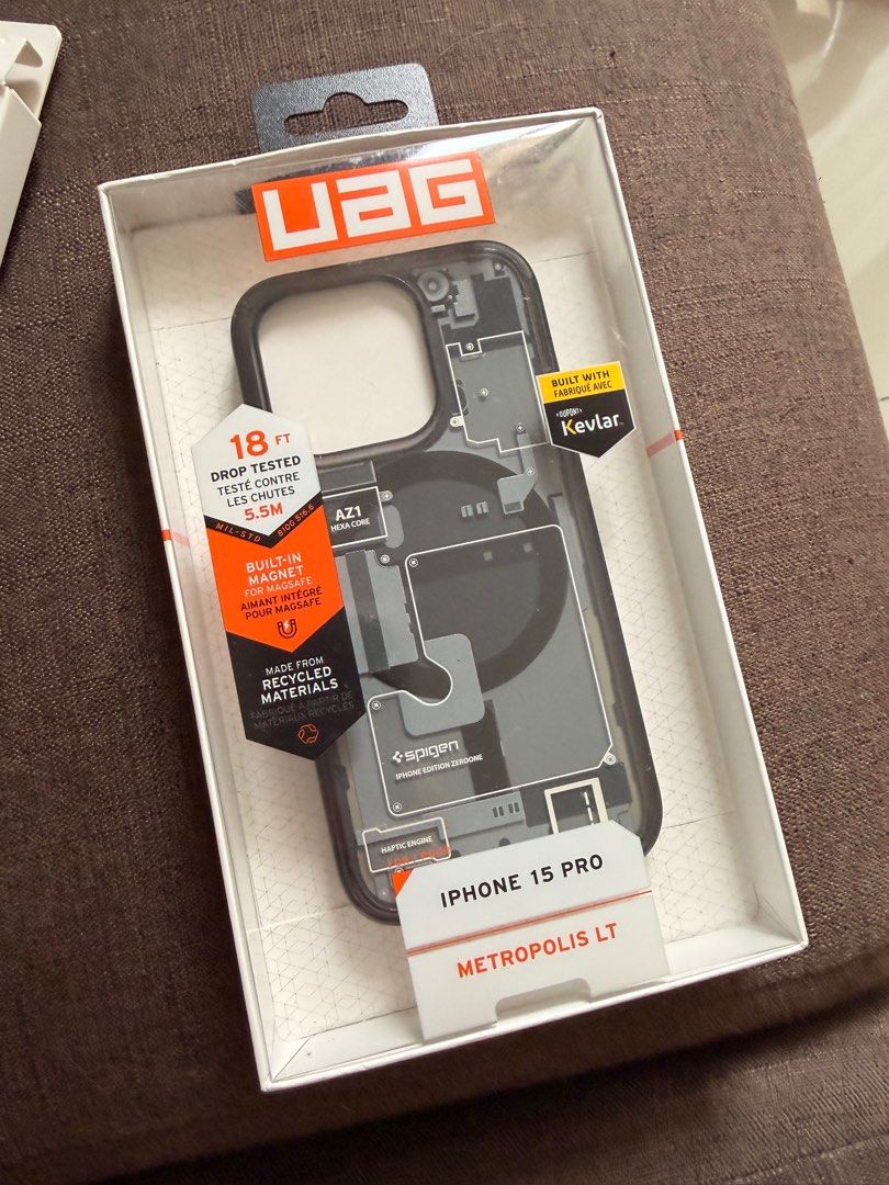 UAG iphone 15 pro (Category: Cases & Sleeves) located in Taguig. Submitted by cams_declutter (Listing ID 1413933111, Image 2). Description: - UAG Metropolis LT case for iPhone 15 Pro - Constructed with Kevlar - Drop tested to 18ft - Features built-in magnets for MagSafe - Stylish transparent design.