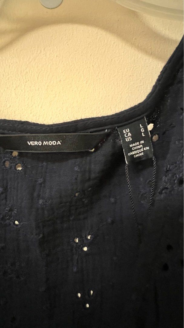 Vero Moda Long Casual Dress (Category: Dresses) located in Santa Rosa. Submitted by bebs_11 (Listing ID 1413880470, Image 2). Description: Navy blue dress from Vero Moda. It is a sleeveless wrap dress with eyelet detailing. The size is L. The dress has a V-neckline and a tie closure at the waist. .