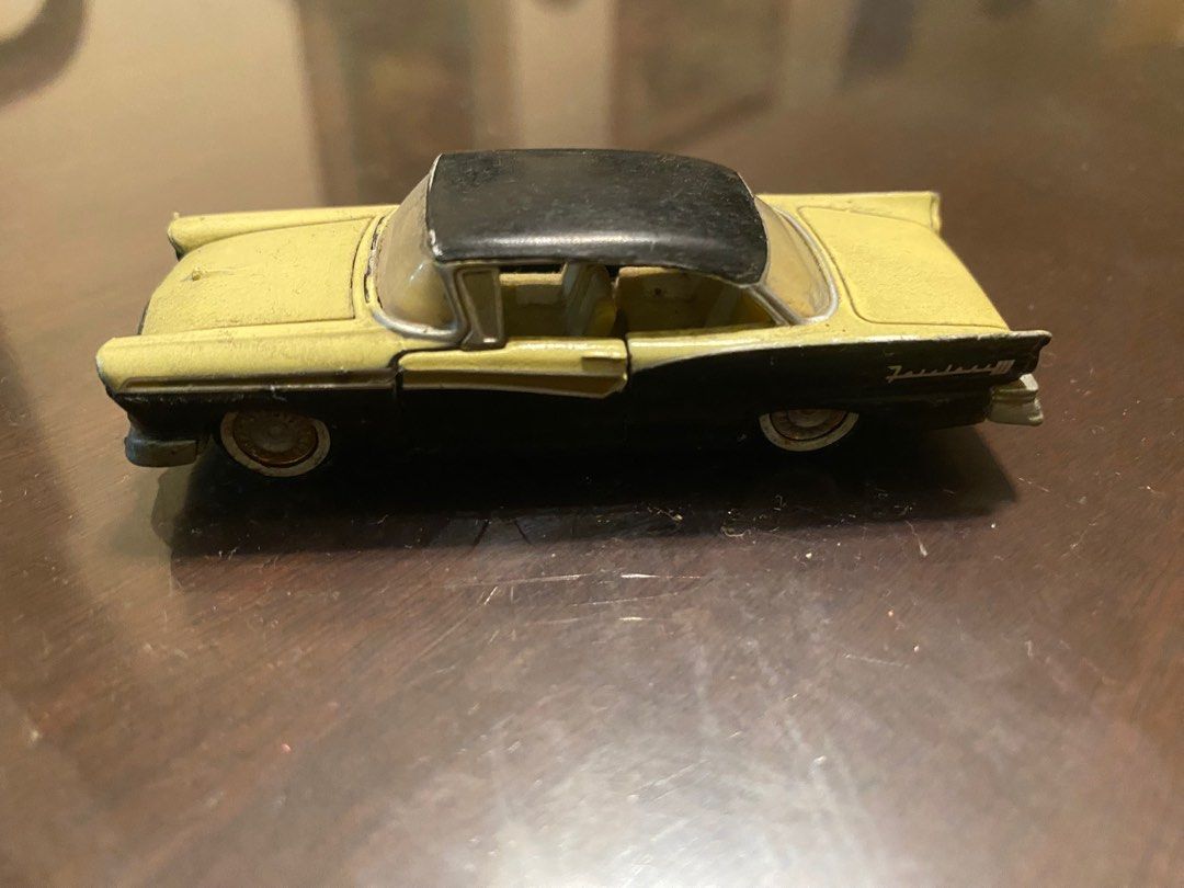Vintage Ford Thunderbird Toy Car (Category: Vehicle & Diecast Models) located in Pasig City. Submitted by ecochicsales (Listing ID 1413881839, Image 1). Description: - Vintage Ford Thunderbird toy car - Black roof and two-tone body - Doors open - Made in China markings - Metal body construction - White-walled tires - Classic collectible item.