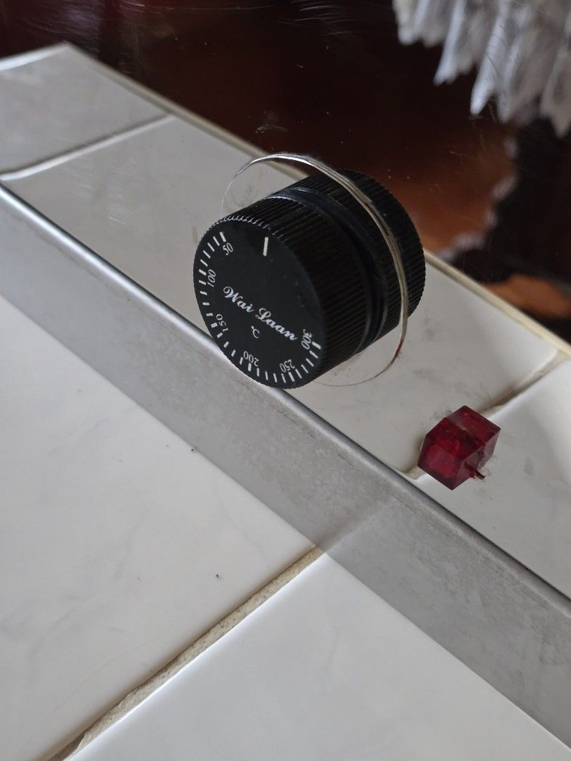 Wai Laan Waffle Maker (Category: Breadmakers) located in Antipolo. Submitted by arya2k18 (Listing ID 1413971688, Image 3). Description: Wai Laan waffle maker is designed to make six stick waffles at a time. It features a temperature control dial with settings up to 300 degrees Celsius. The power indicator light is visible..