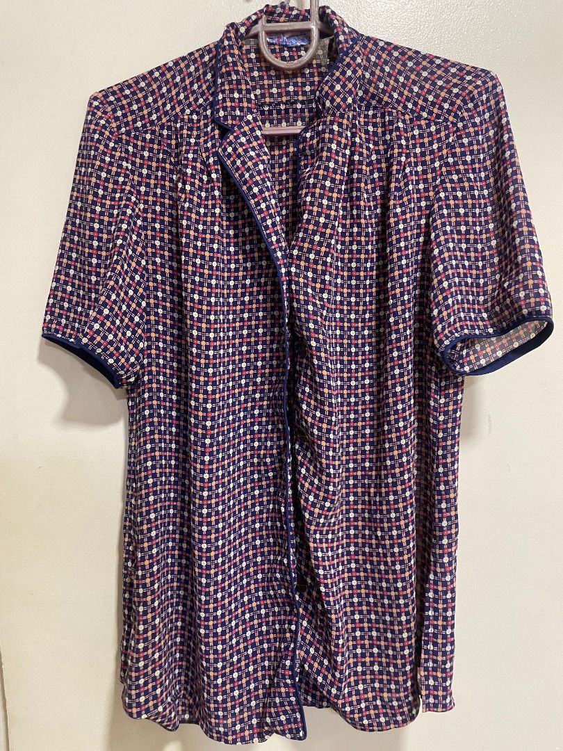 White Rabbit Vintage Blouse - Small (Category: Blouses) located in Mandaluyong City. Submitted by _copndrop (Listing ID 1414009309, Image 1). Description: Vintage blouse from White Rabbit. Features a checkered pattern in navy, red, and beige. It has short sleeves with navy trim and a collared neckline. The blouse has a button-down front. Size small. NO WHEN WORN PICS RFS: DECLUTTERING SMALL ON TAG LOC: MANDALUYONG.
