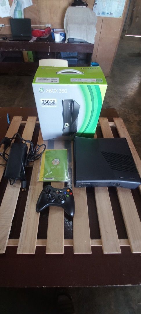 Xbox 360 250GB Console with Controller (Category: Xbox) located in Impasugong. Submitted by sid_the_adorable (Listing ID 1414048811, Image 1). Description: Xbox 360 console with a 250GB hard drive. Includes one black controller, power adapter, and the original box. Also includes a game disc. The console has been tested and is working. Several games are installed on the console, including Resident Evil 4, and more. see pics for games box is good c