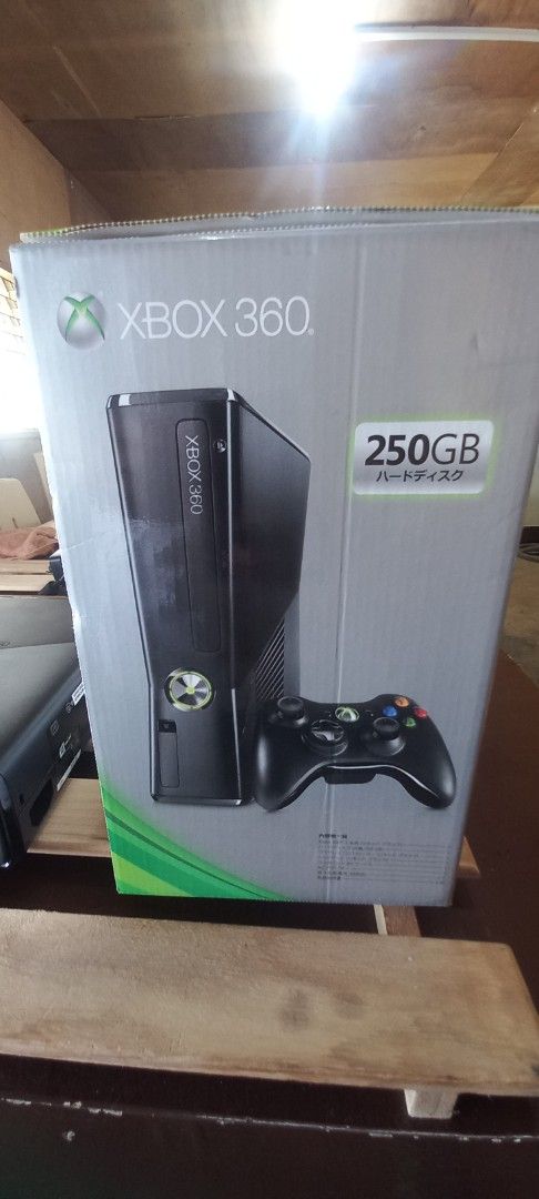 Xbox 360 250GB Console with Controller (Category: Xbox) located in Impasugong. Submitted by sid_the_adorable (Listing ID 1414048811, Image 2). Description: Xbox 360 console with a 250GB hard drive. Includes one black controller, power adapter, and the original box. Also includes a game disc. The console has been tested and is working. Several games are installed on the console, including Resident Evil 4, and more. see pics for games box is good c