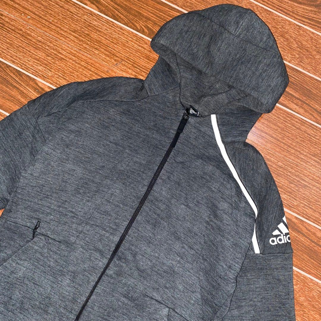 Adidas Full zip Hoodie (Category: Coats, Jackets and Outerwear) located in Antipolo. Submitted by Thriftdrip_gang (Listing ID 1414148927, Image 3). Description: Adidas zip hoodie Size: Medium, 20x27 Color rate: 9.8/10 Excellent condition No flaws 700.