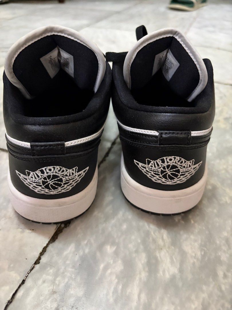 Air Jordan 1 Mid Black White (Category: Sneakers) located in Muntinlupa City. Submitted by patats (Listing ID 1414180262, Image 3). Description: - Air Jordan 1 Mid - Classic black and white colorway - Iconic Air Jordan logo on tongue - Air Jordan wings logo on heel - Black laces - White midsole - Leather upper.