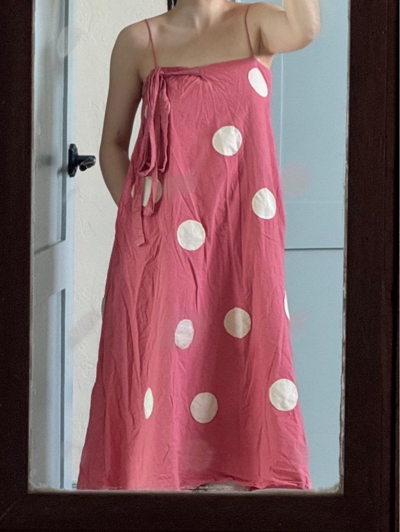 Anika Custom Pierra Dress (Category: Dresses) located in Quezon City. Submitted by pre.by.a (Listing ID 1414112200, Image 1). Description: Color: Frose + Light Oat Size: S Length: 48" Length: Cotton Linen True to size. A-line silhouette midi dress with pockets. Ribbon strap detail can be worn front or back and can be worn bowed or double knotted. Polka dots are cut and hand sewn one by one..