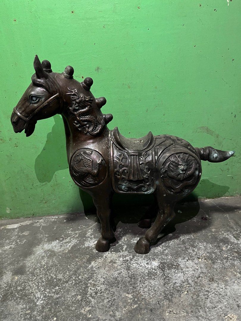 Antique Bronze Horse Statue (Category: Figurines & Statues) located in Manila. Submitted by vintage_styles_co (Listing ID 1414241051, Image 1). Description: - Antique bronze horse statue - Intricate dragon and phoenix details - Includes saddle and bridle - Standing position - Weathered, antique look - Perfect for home decoration.