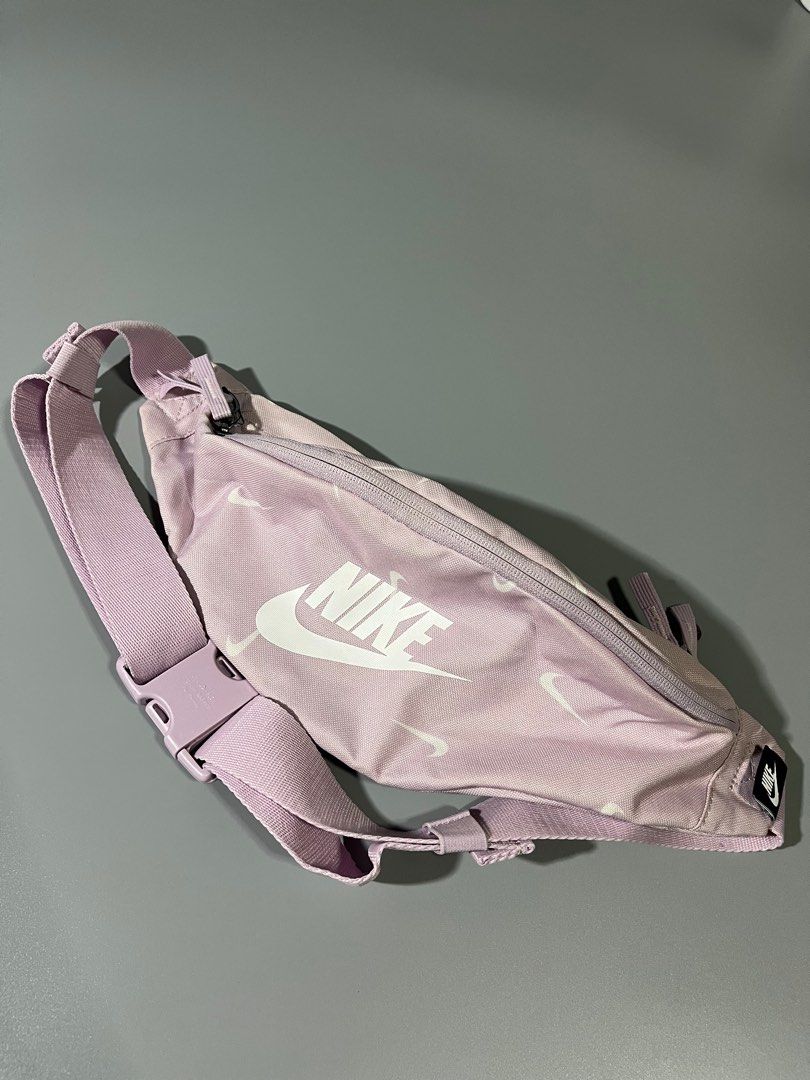 Authentic Nike Pastel Purple Belt Bag (Category: Belt bags, Clutches and Pouches) located in Manila. Submitted by johncarylph (Listing ID 1414163707, Image 1). Description: Minor dot stain at the back portion only (unnoticeable when worn).