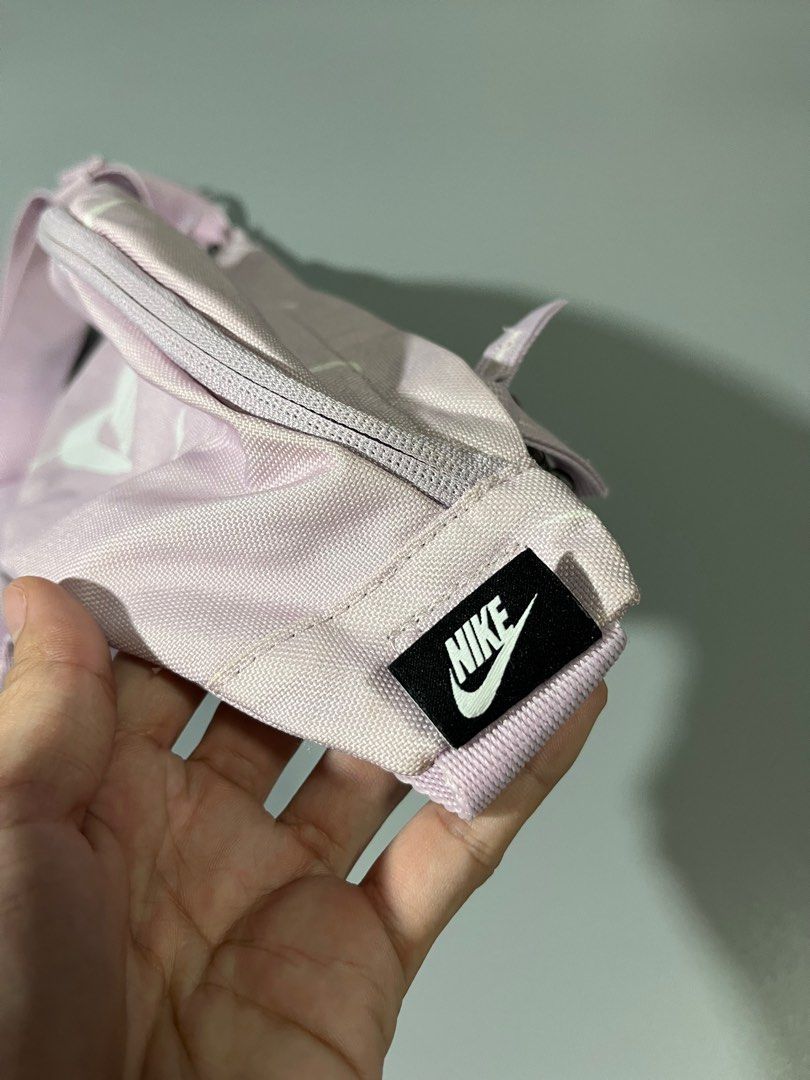 Authentic Nike Pastel Purple Belt Bag (Category: Belt bags, Clutches and Pouches) located in Manila. Submitted by johncarylph (Listing ID 1414163707, Image 3). Description: Minor dot stain at the back portion only (unnoticeable when worn).