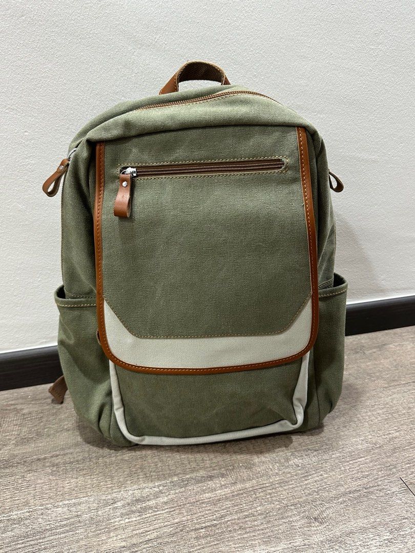Backpack (Category: Backpacks) located in Singapore. Submitted by vernibink (Listing ID 1414150694, Image 4). Description: BRAND NEW ERGONOMIC AND FASHIONABLE BACKPACK COMES IN 2 COLOURS!!! ⭐️Designed for smart and comfortable travel, this backpack combines functionality, security, and convenience in one sleek design. ⭐️Features a luggage trolley sleeve for hands-free travel, a chest strap for better weight distribution and stability, and multipl