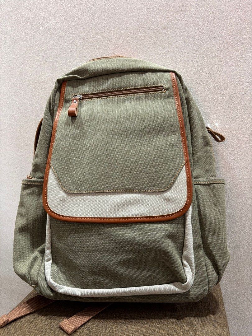 Backpack (Category: Backpacks) located in Singapore. Submitted by vernibink (Listing ID 1414150694, Image 3). Description: BRAND NEW ERGONOMIC AND FASHIONABLE BACKPACK COMES IN 2 COLOURS!!! ⭐️Designed for smart and comfortable travel, this backpack combines functionality, security, and convenience in one sleek design. ⭐️Features a luggage trolley sleeve for hands-free travel, a chest strap for better weight distribution and stability, and multipl