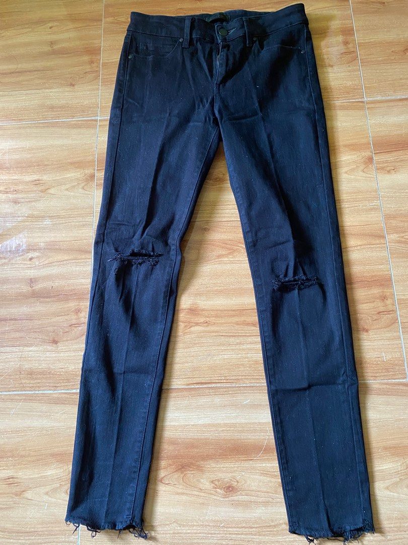 Black Ripped Jeans (Category: Jeans) located in Cagayan de Oro. Submitted by ecolive (Listing ID 1414065886, Image 1). Description: - Black ripped jeans - High-waisted - Straight leg cut - Frayed hem - Button and zipper closure.
