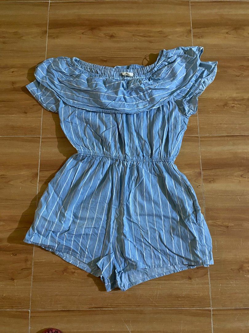 Blue Striped Off-Shoulder Romper (Category: Rompers) located in Cagayan de Oro. Submitted by ecolive (Listing ID 1414066783, Image 1). Description: Blue romper features a striped pattern and an off-shoulder design. It has short sleeves and a cinched waist. The romper has a relaxed fit and a comfortable style. It's a versatile piece that can be dressed up or down..