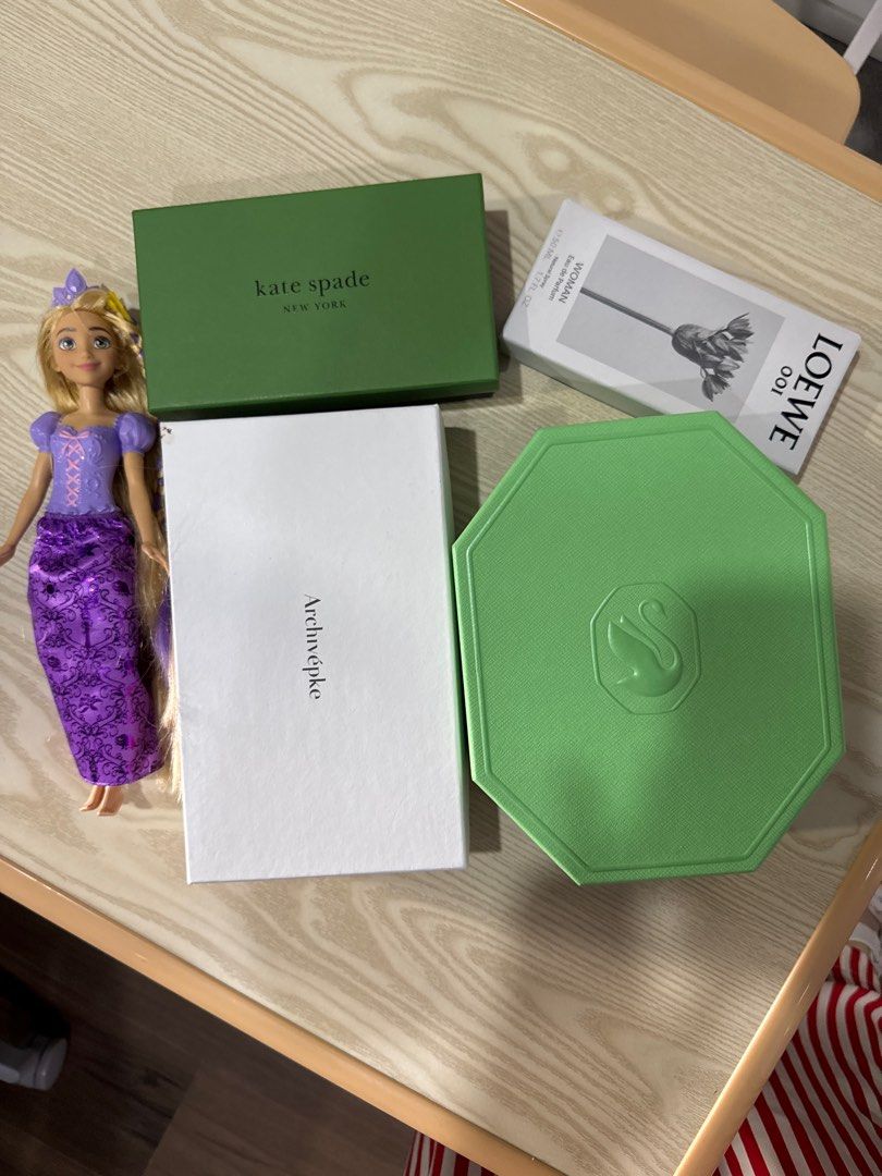 BUNDLE BOX - Kate Spade, Swarovski, Loewe Perfume & Archivepke (Category: Accessory Holder, Box & Organizers) located in Makati City. Submitted by stellularx (Listing ID 1414056456, Image 1). Description: - White Archivepke box. - Green Kate Spade box. - Green Swarovski box with logo. - White Loewe perfume box with floral design. Rapunzel doll NOT INCLUDED. Only for scale so you know the size. .