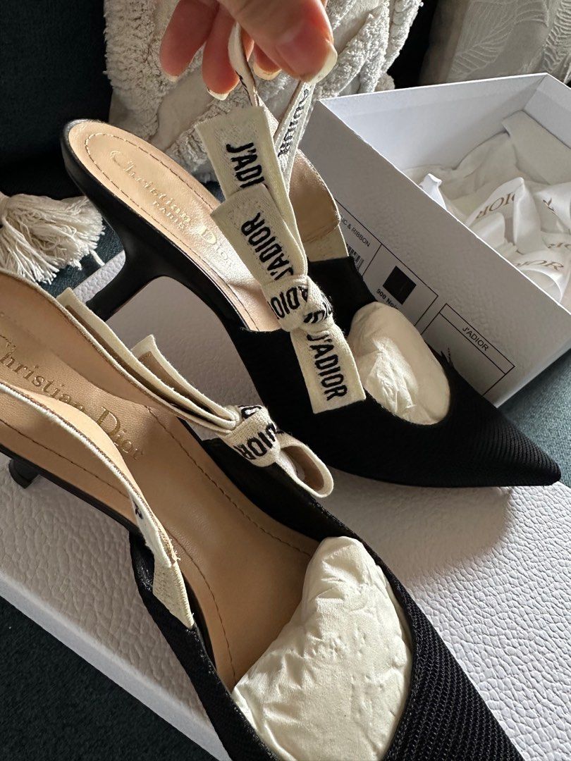 Christian Dior J'Adior Slingback Heels (Category: Heels) located in San Juan City. Submitted by fabbagger62976 (Listing ID 1414184804, Image 2). Description: - Authentic Christian Dior J'Adior slingback heels - Black knit upper - Pointed toe - Slingback strap with "J'ADIOR" logo - Size 39.5 - Includes original box, dust bag, and care cards - Used once, with sole protector.
