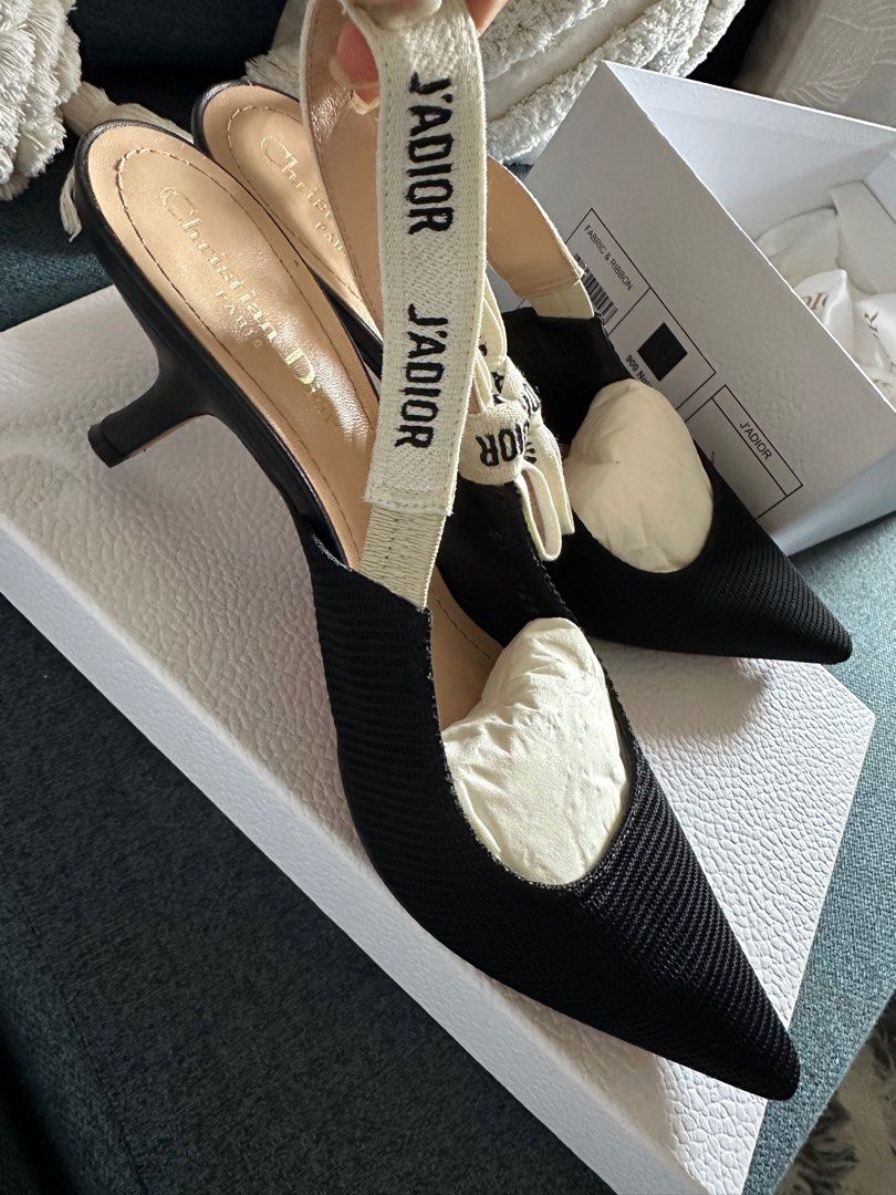 Christian Dior J'Adior Slingback Heels (Category: Heels) located in San Juan City. Submitted by fabbagger62976 (Listing ID 1414184804, Image 3). Description: - Authentic Christian Dior J'Adior slingback heels - Black knit upper - Pointed toe - Slingback strap with "J'ADIOR" logo - Size 39.5 - Includes original box, dust bag, and care cards - Used once, with sole protector.