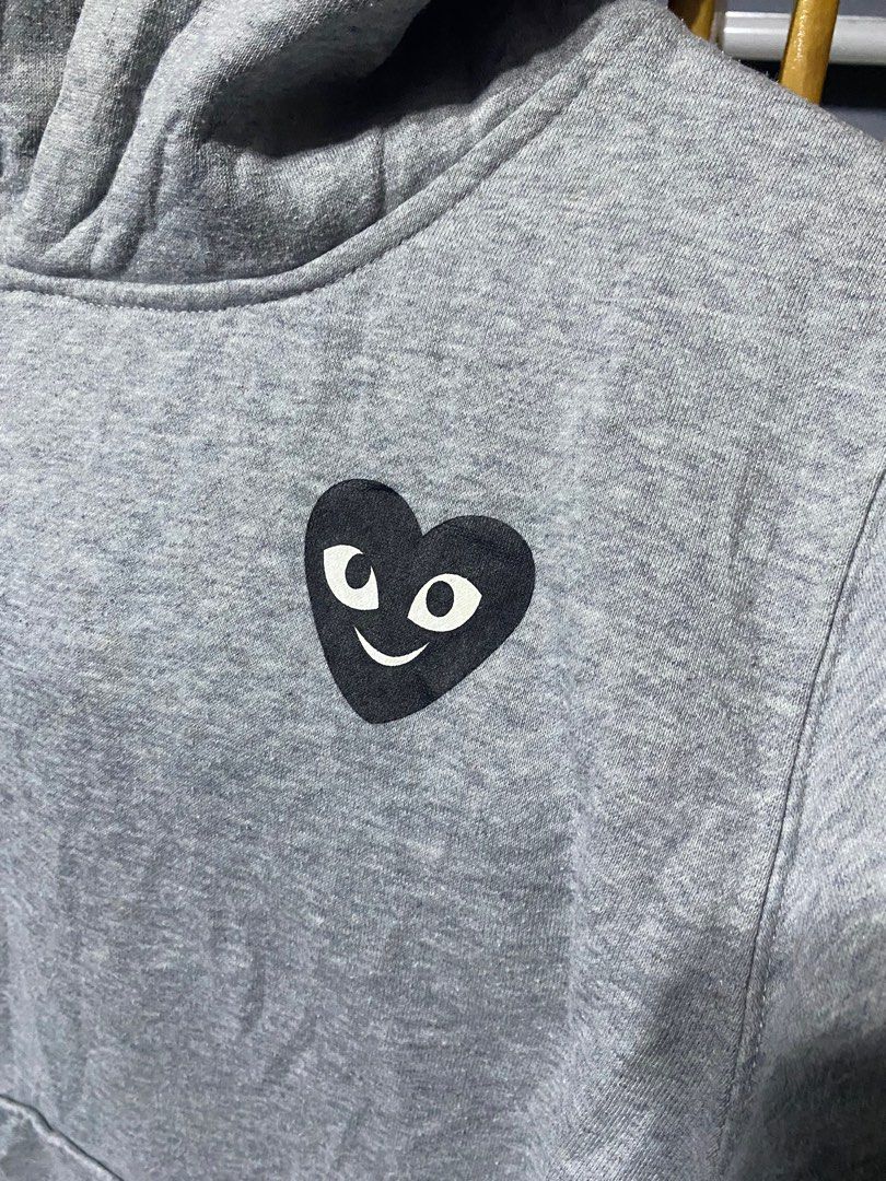 Comme des Garcons Play Hoodie (Category: Luxury Apparel) located in Santa Ana. Submitted by tunes_vtg (Listing ID 1414162773, Image 3). Description: - Comme des Garcons Play hoodie - Size: Xl Women medium Men - Iconic heart logo on front - Graphic print on back - Features a hood and kangaroo pocket - Made of 100% cotton - Brand and size tag present - Excellent Condition - Issue Minimal lints not visible at all - Complete Tags - Dimes:L25xW21 ₱550