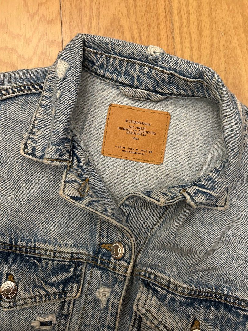 Denim Jacket (Category: Coats, Jackets and Outerwear) located in Pasig City. Submitted by gdeclutterwithme (Listing ID 1414214694, Image 2). Description: - Stradivarius denim jacket - Light blue wash & Distressed design - Relaxed fit - Vintage look - Size: M 20 x 19 dm for more details .