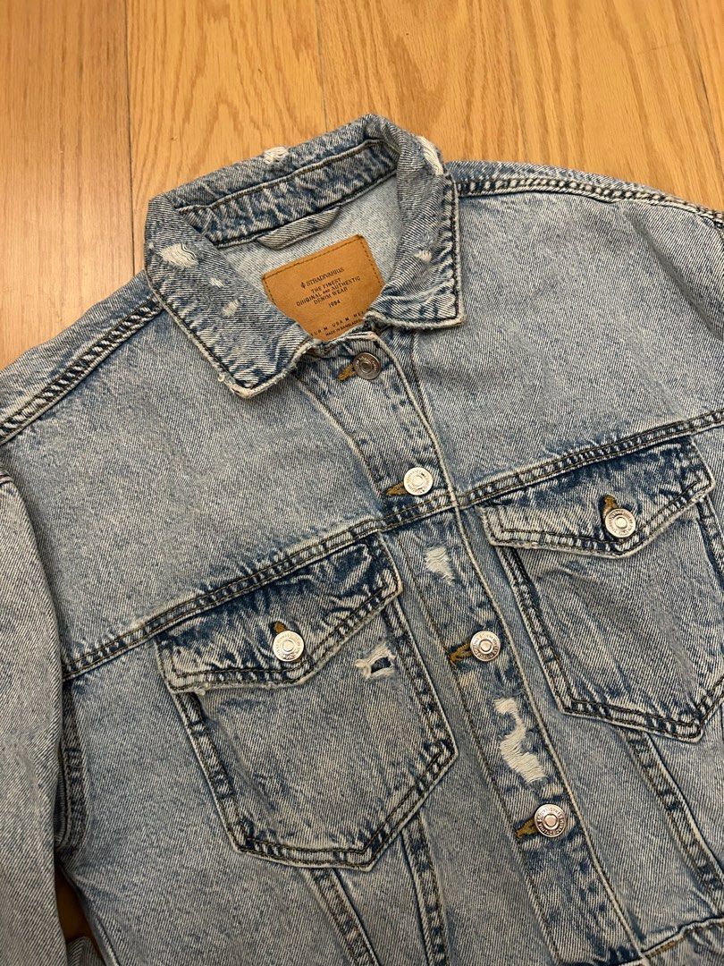Denim Jacket (Category: Coats, Jackets and Outerwear) located in Pasig City. Submitted by gdeclutterwithme (Listing ID 1414214694, Image 3). Description: - Stradivarius denim jacket - Light blue wash & Distressed design - Relaxed fit - Vintage look - Size: M 20 x 19 dm for more details .