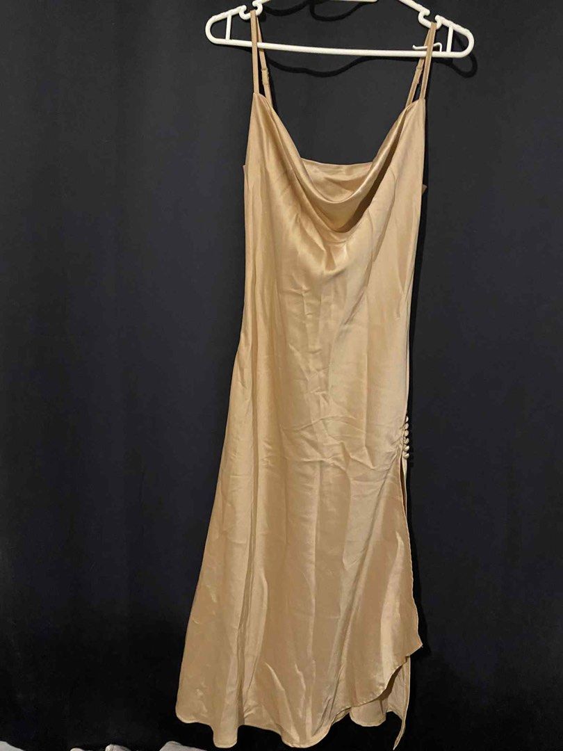 Formal Long Dress - Fits S-M (Category: Dresses) located in Quezon City. Submitted by rarefinder_ane (Listing ID 1414170552, Image 2). Description: - Gold formal long dress - Cowl neckline - Spaghetti straps - Side slit with button details - Fits sizes S-M - Perfect for special occasions Shipping/delivery to be arranged by buyer Loc: Quezon City.