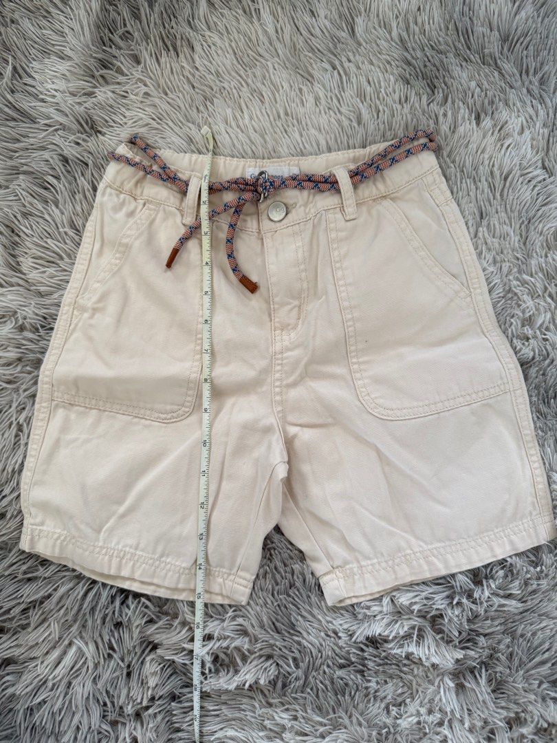 Gingersnaps Beige Shorts with Belt (Category: Babies & Kids Fashion) located in Muntinlupa City. Submitted by caistuff (Listing ID 1414124689, Image 2). Description: - Gingersnaps beige shorts - Includes matching belt - Features button closure and pockets - Neutral color for versatile styling Measurements: - L: 15 in - W: 15 in.