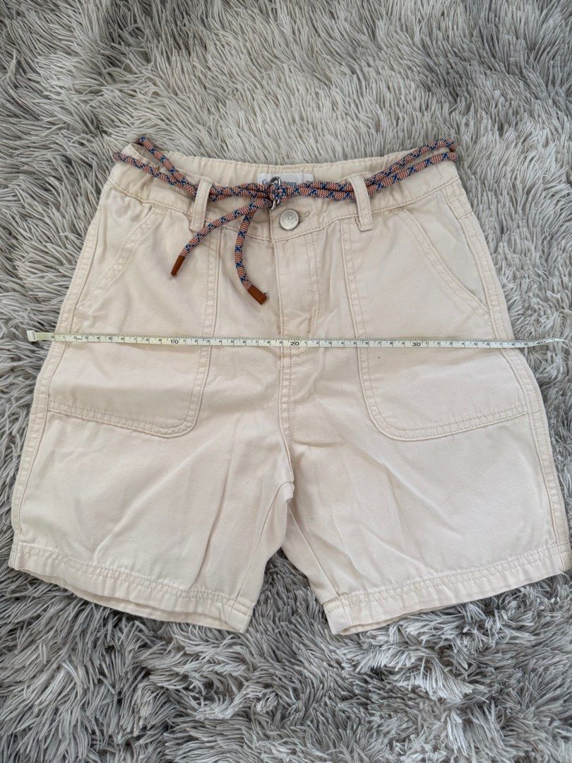Gingersnaps Beige Shorts with Belt (Category: Babies & Kids Fashion) located in Muntinlupa City. Submitted by caistuff (Listing ID 1414124689, Image 3). Description: - Gingersnaps beige shorts - Includes matching belt - Features button closure and pockets - Neutral color for versatile styling Measurements: - L: 15 in - W: 15 in.