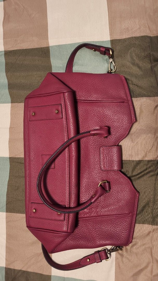 Fino Red Leather Handbag (Category: Luxury Bags & Wallets) located in Manila. Submitted by decutteringbyjel (Listing ID 1414087186, Image 1). Description: - Elevate your look with this Classy Red Fino handbag - Really good condition - Top handle and detachable shoulder strap - Flap closure with lock - Interior zippered pocket - Textured leather - Gold-toned hardware - Structured shape Bundle: free any item of your choice that is under 1k..