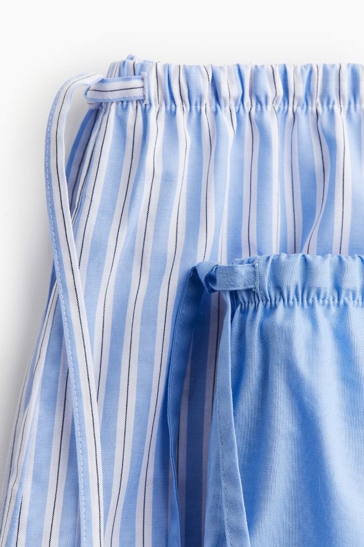 H&M 2-Pack Pyjama Shorts (Medium) (Category: Undergarments & Loungewear) located in San Pedro. Submitted by cherelune (Listing ID 1414118167, Image 2). Description: BNEW with tag Color: Light blue/Striped Size: Medium Pyjama shorts in soft cotton poplin. Relaxed fit with an elasticated drawstring waist, and a short slit at the side of the hem. Pieces/Pairs: 2 Description: Light blue/Blue/White/Black, Striped Length: Short Waist Rise: Regular wais