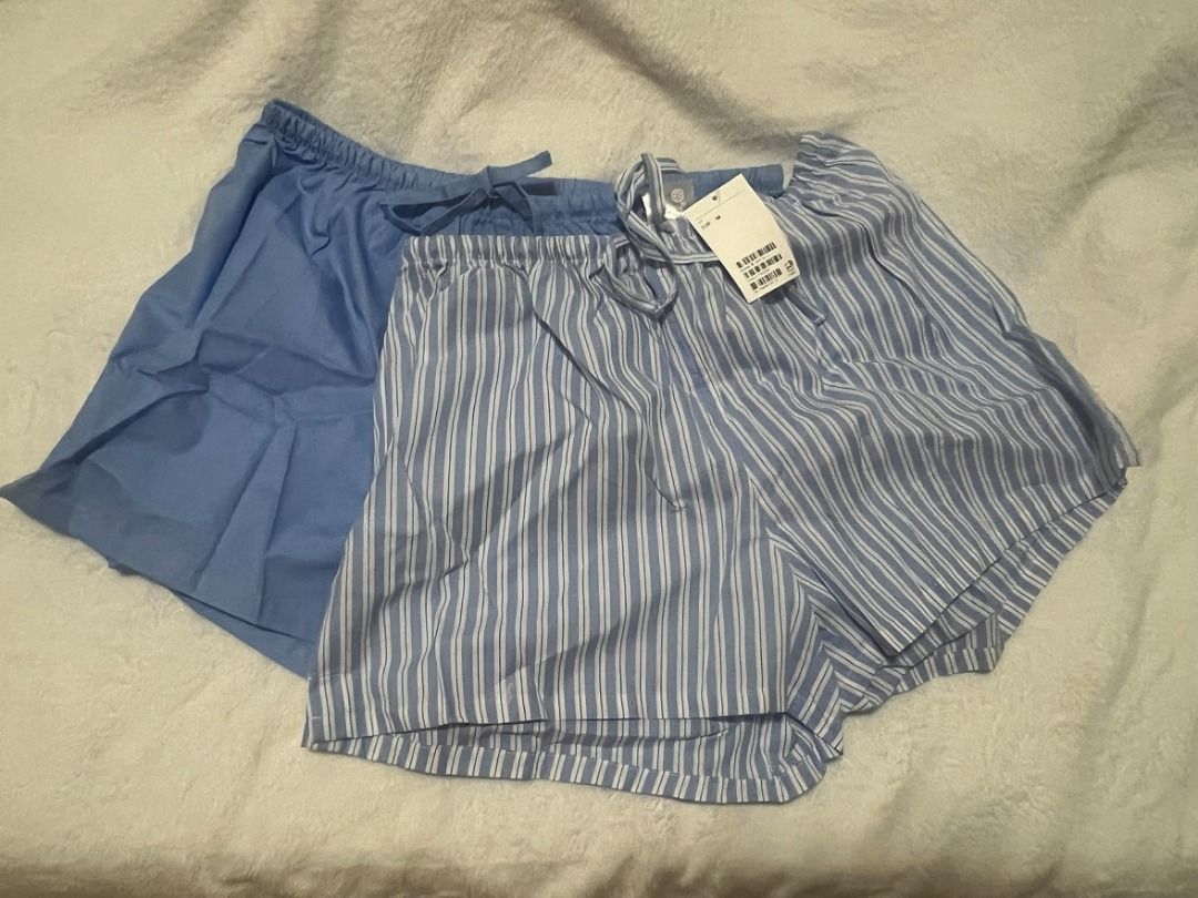 H&M 2-Pack Pyjama Shorts (Medium) (Category: Undergarments & Loungewear) located in San Pedro. Submitted by cherelune (Listing ID 1414118167, Image 3). Description: BNEW with tag Color: Light blue/Striped Size: Medium Pyjama shorts in soft cotton poplin. Relaxed fit with an elasticated drawstring waist, and a short slit at the side of the hem. Pieces/Pairs: 2 Description: Light blue/Blue/White/Black, Striped Length: Short Waist Rise: Regular wais