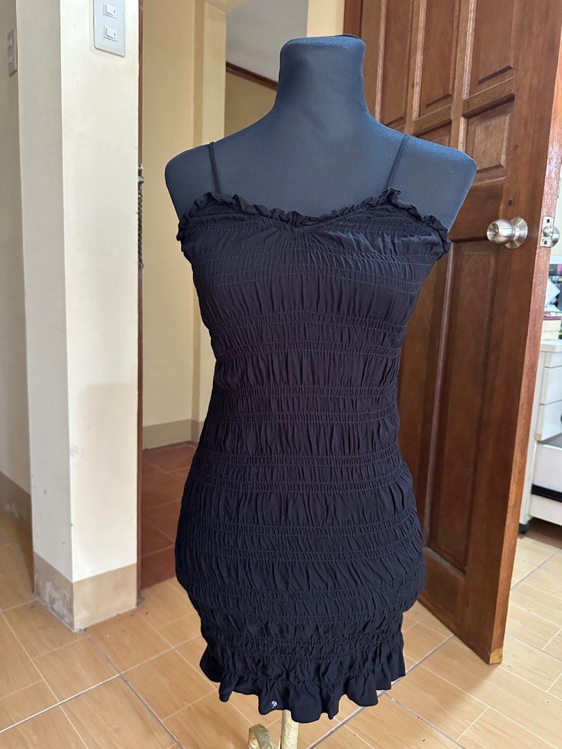 H&M BLACK DRESS (Category: Dresses) located in Baguio. Submitted by zafispicks (Listing ID 1414128693, Image 2). Description: - H&M black mini dress - Smocked bodice - Spaghetti straps - Ruffled neckline and hem - Size: EUR XS, US XS, CA TP, MXXCH, CN 155/80A - Versatile for casual or night out.