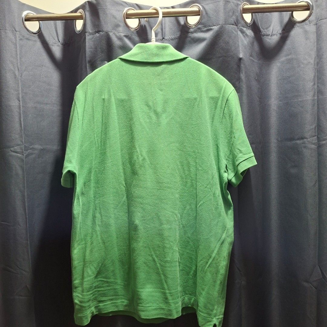 Lacoste Green Polo Shirt (Category: Tshirts & Polo Shirts ) located in Makati City. Submitted by kenan.g (Listing ID 1414122842, Image 3). Description: - Green Lacoste polo shirt - Size 4 (Medium) - Features the iconic crocodile logo - Classic polo collar and two-button placket - Made of pique fabric - Versatile for everyday wear Price: PHP 380.00 (shipping fee not included).