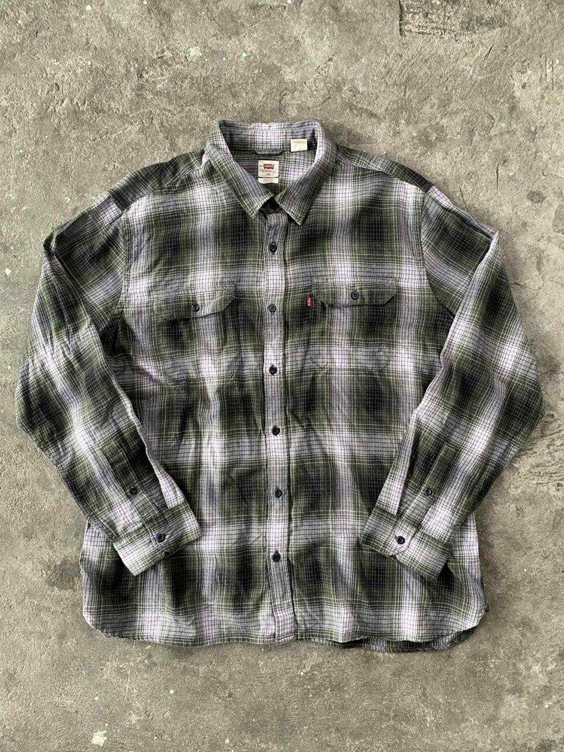 Levi's Plaid Button-Up Shirt XXL (Category: Tshirts & Polo Shirts ) located in Lipa City. Submitted by dcd1217 (Listing ID 1414247122, Image 1). Description: - Levi's plaid button-up shirt - Color: Green, white, and black - Size: XXL - Fit: Standard - Material: 100% cotton - Features: Two chest pockets, classic collar, buttoned cuffs - Details: Small red Levi's logo Authentic Shipped jnt asap Message me for any concerns.
