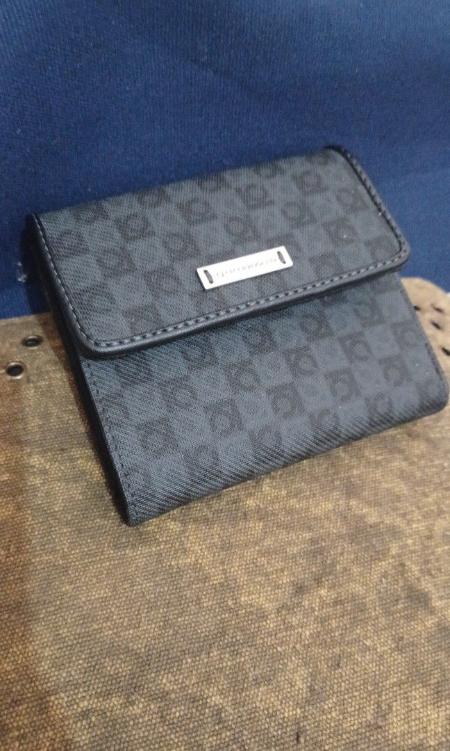 Liz Claiborne black checkered trifold wallet (Category: Luxury Bags & Wallets) located in Paranaque City. Submitted by style_bymm (Listing ID 1414115217, Image 1). Description: ⚫️Authentic Liz Claiborne ⚫️ LIKE NEW, as in 😍 ⚫️ small trifold wallet ⚫️ black and checkered pattern with LC initials ⚫️ current owner not used ⚫️ previous owner barely used ⚫️ 7-card compartment.