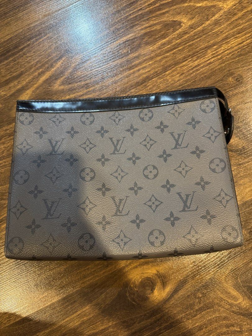 Louis Vuitton Monogram Eclipse Clutch (Category: Luxury Bags & Wallets) located in Muntinlupa City. Submitted by myabcshop (Listing ID 1414234232, Image 2). Description: - Authentic Louis Vuitton Monogram Eclipse clutch - Features the iconic dark grey monogram pattern - Black interior with multiple compartments - Includes a wrist strap - Serial number: FN4250 - Made in Spain 💯 ORIGINAL AND AUTHENTIC.