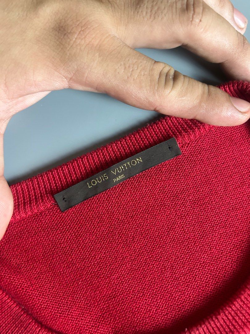 Louis Vuitton Red Cotton Sweater (Category: Luxury Apparel) located in Manila. Submitted by 3rdealz (Listing ID 1414241892, Image 3). Description: Louis Vuitton Marc Jacobs era - Size: L - Made in Italy - Features a large LV logo - Material: 100% cotton - Style: Crew neck, long sleeves - Color: Red - Includes care instructions.