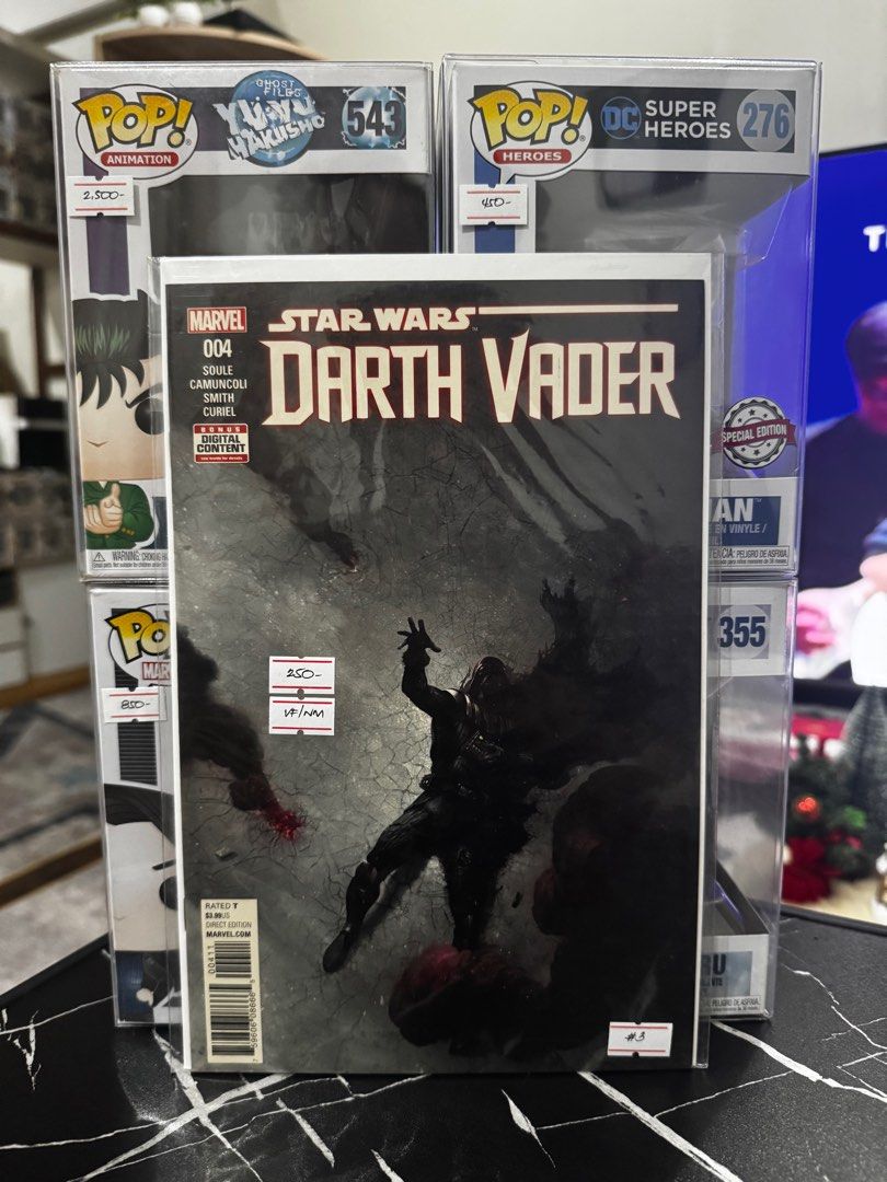 Marvel Star Wars Darth Vader #4 Comic Book (Category: Comics & Manga) located in Pateros City. Submitted by lacasadekartonph (Listing ID 1414129211, Image 1). Description: - Marvel Star Wars: Darth Vader #4 comic book - Features Darth Vader on the cover - Creators: Soule, Camuncoli, Smith, Curiel - Rated T - Includes digital content - Price: ₱250 - Comes in a protective sleeve.
