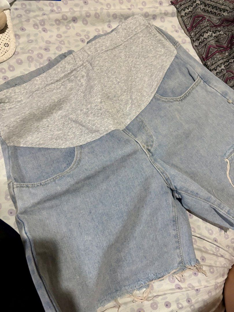 Mother 2 Be Maternity Shorts and Pants (Category: Maternity wear) located in San Juan City. Submitted by _anojeiram (Listing ID 1414119045, Image 1). Description: - Maternity Shorts: Light blue denim, adjustable elastic waistband, gray fabric panel. (no brand) - Maternity Pants: Black and navy blue, size XL, Mother 2 Be tag, with pockets. - Both items are pre-loved so manage your expectations. Guaranteed in good condition, just need to wash for h