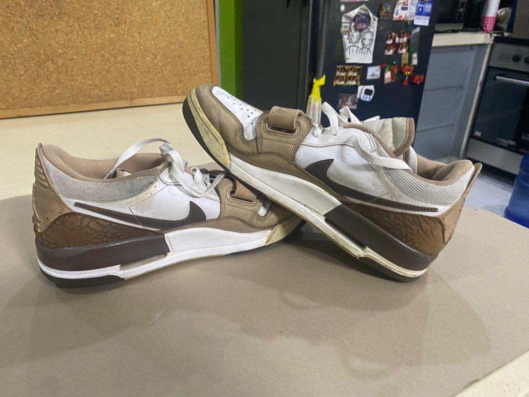 Nike Jordan Legacy 312 Low Brown Elephant (Category: Sneakers) located in Manila. Submitted by ryanngo0653 (Listing ID 1414153335, Image 3). Description: These Jordan Legacy 312 Low sneakers feature a brown and white colorway with elephant print detailing. They have a strap across the laces with the Nike logo. The soles have a Jordan logo. Price Negotiable LBC Lalamove Grab Jnt.