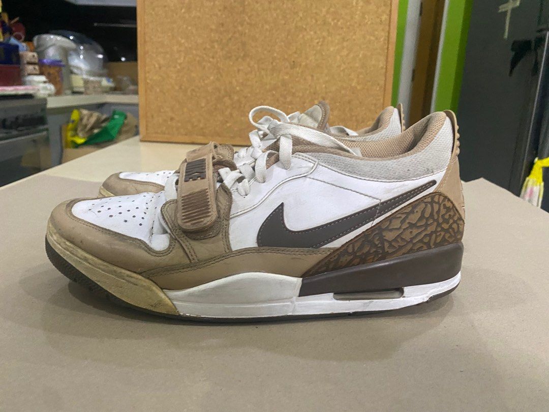Nike Jordan Legacy 312 Low Brown Elephant (Category: Sneakers) located in Manila. Submitted by ryanngo0653 (Listing ID 1414153335, Image 1). Description: These Jordan Legacy 312 Low sneakers feature a brown and white colorway with elephant print detailing. They have a strap across the laces with the Nike logo. The soles have a Jordan logo. Price Negotiable LBC Lalamove Grab Jnt.
