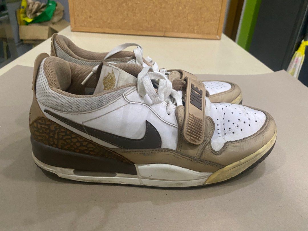 Nike Jordan Legacy 312 Low Brown Elephant (Category: Sneakers) located in Manila. Submitted by ryanngo0653 (Listing ID 1414153335, Image 2). Description: These Jordan Legacy 312 Low sneakers feature a brown and white colorway with elephant print detailing. They have a strap across the laces with the Nike logo. The soles have a Jordan logo. Price Negotiable LBC Lalamove Grab Jnt.