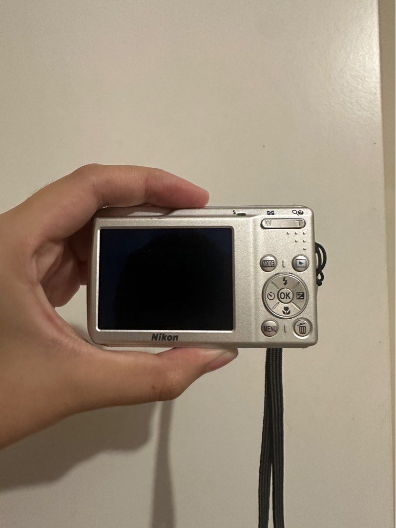 Nikon Coolpix S210 Digital Camera (Category: Cameras) located in Santo Tomas. Submitted by j_yan27 (Listing ID 1414186593, Image 2). Description: Nikon Coolpix S210 ₱3,599 (negotiable) + SF super mint condition! Specs: - 8.0 Megapixel - 2.4 inch LCD - Working flash - Working zoom - Full HD results Inclusions: unit, battery, strap, SD card (2GB), battery charger, case. Issues: Slim blue line on outputs (not that visible!) RFS: Will upgrade to a ne