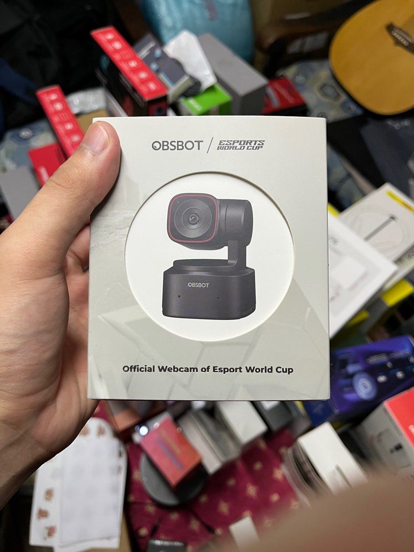 OBSBOT TINY 2 LITE (Category: Webcams) located in Hulu Langat. Submitted by killerbee00 (Listing ID 1414238478, Image 2). Description: - Brand new OBSBOT webcam - Designed for the Esports World Cup - Sleek black design with red accent - Ideal for streaming and video conferencing - Comes in original packaging - Features the OBSBOT logo.