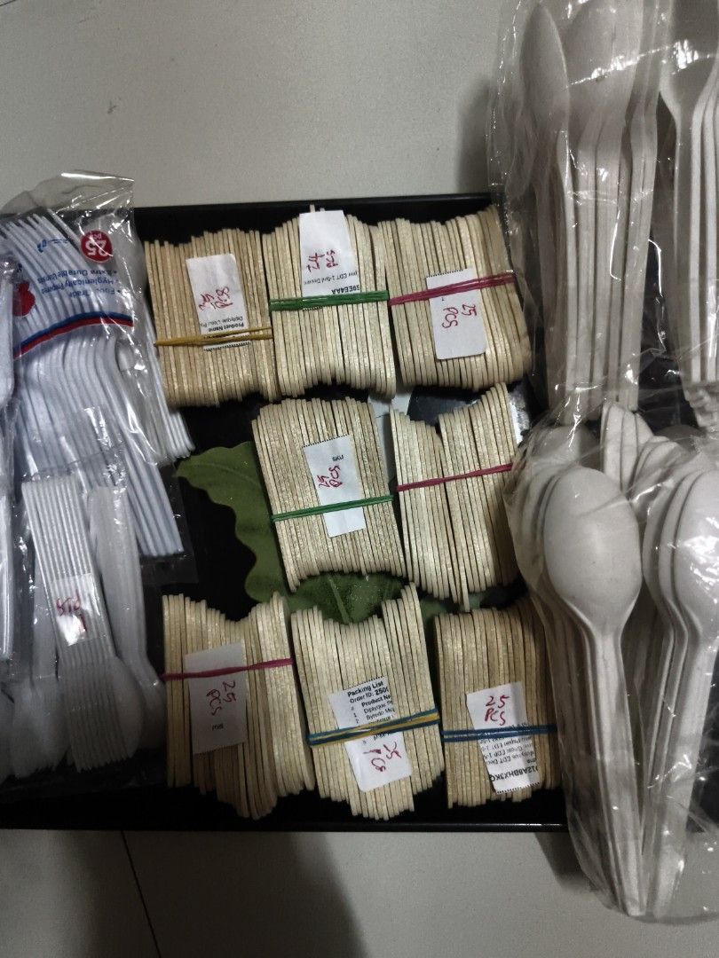 Plastic and wooden spoons and forks (Category: Dinnerware & Cutlery) located in Makati City. Submitted by harvesting_game (Listing ID 1414170214, Image 3). Description: sold as a bundle of various plastic and wooden spoons and forks. wood ice cream spoon 198 pieces plastic spoons and forks 175 PCs.