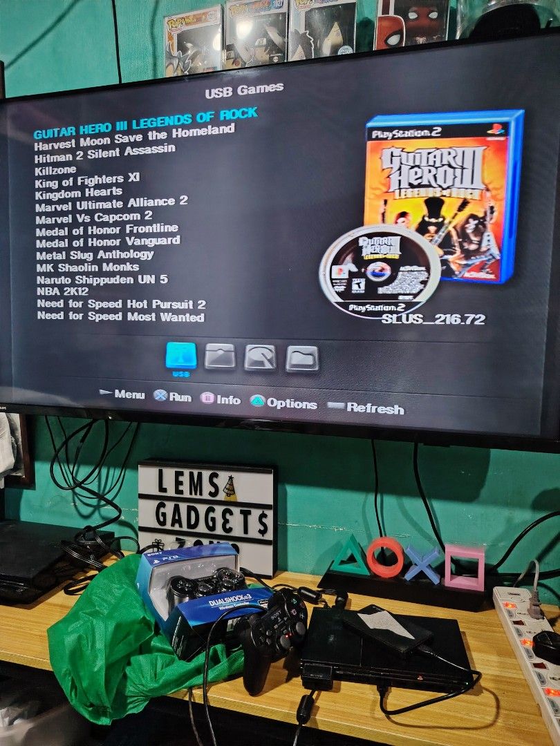 PlayStation 2 Games USB Games (Category: PlayStation) located in Manila. Submitted by lemsgadgetszone (Listing ID 1414225065, Image 2). Description: Offering a selection of PlayStation 2 games playable via USB. Games include Alone in the Dark, Guitar Hero III, Sniper Elite, WWE Smackdown vs Raw 2011, and Need for Speed Underground 2. The console and controllers are also included. Please inquire for specific game availability and pricing..