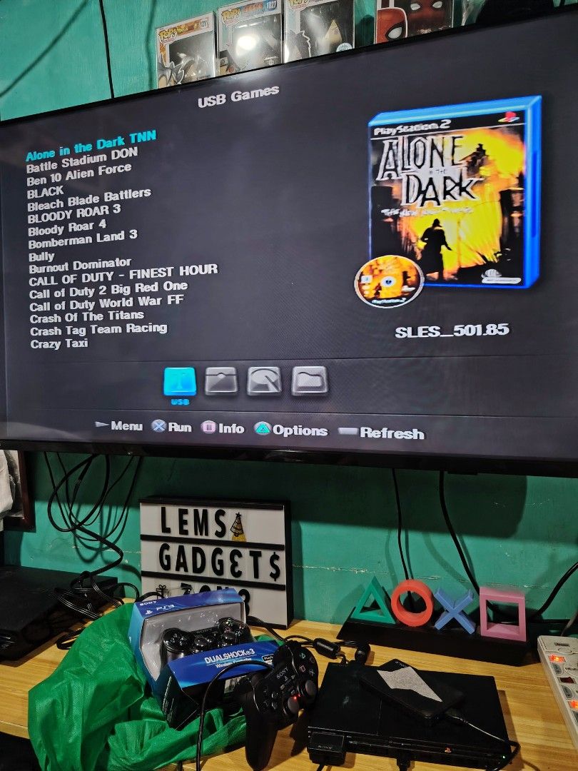 PlayStation 2 Games USB Games (Category: PlayStation) located in Manila. Submitted by lemsgadgetszone (Listing ID 1414225065, Image 1). Description: Offering a selection of PlayStation 2 games playable via USB. Games include Alone in the Dark, Guitar Hero III, Sniper Elite, WWE Smackdown vs Raw 2011, and Need for Speed Underground 2. The console and controllers are also included. Please inquire for specific game availability and pricing..