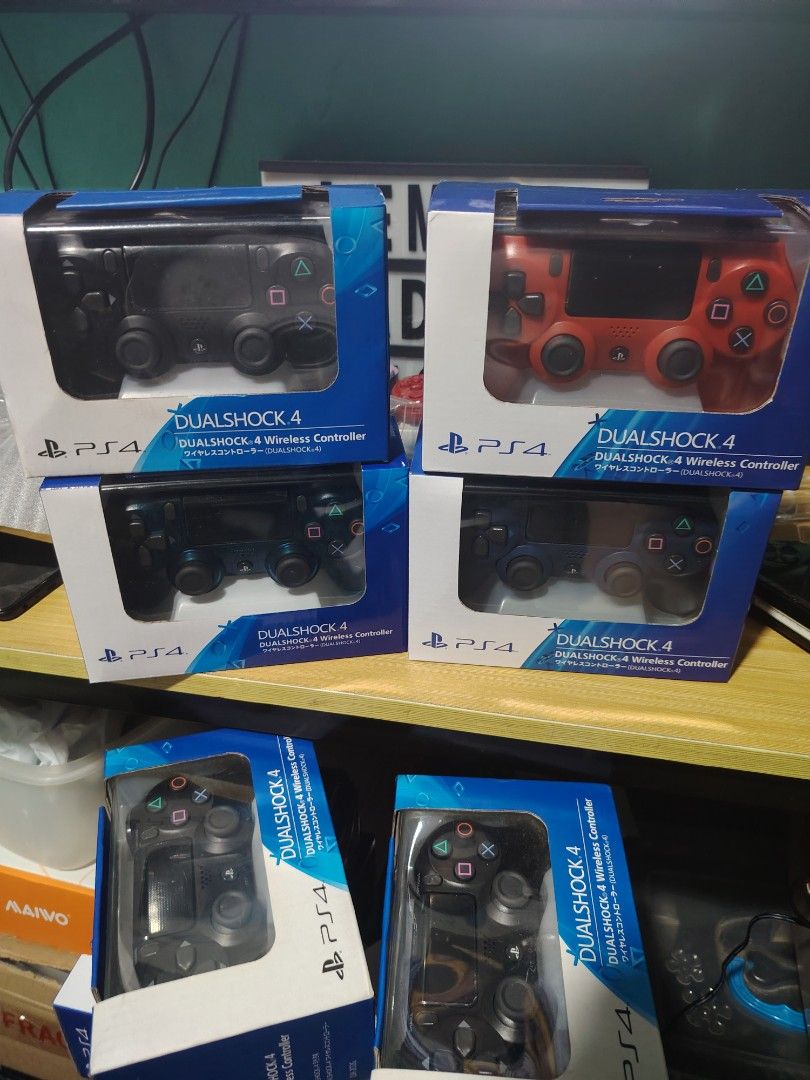 PS4 DualShock 4 Wireless Controller (Category: Controllers) located in Manila. Submitted by lemsgadgetszone (Listing ID 1414209138, Image 1). Description: - Oem DualShock 4 wireless controllers for PS4. - Available colors: Black, Red, and Blue. - Each controller is brand new and comes in its original packaging. - Ideal for replacing a faulty controller or adding an extra one for multiplayer gaming..