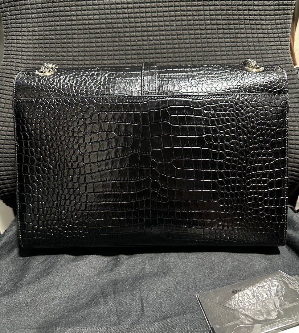 Saint Laurent crocodile embossed envelope bag (Category: Luxury Bags & Wallets) located in Atok. Submitted by fullroom.dgs (Listing ID 1414187898, Image 2). Description: Saint Laurent crocodile embossed envelope bag authentic rank a to sa.